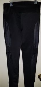 Black pants with side faux leather patches